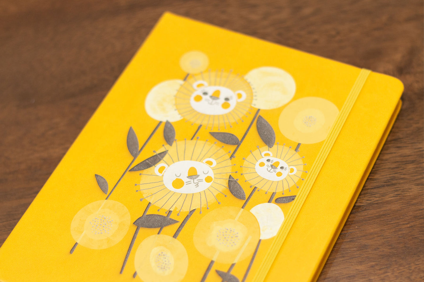 Thoughtful gift with vibrant dandelion design. Perfect journal for note-taking and journaling.